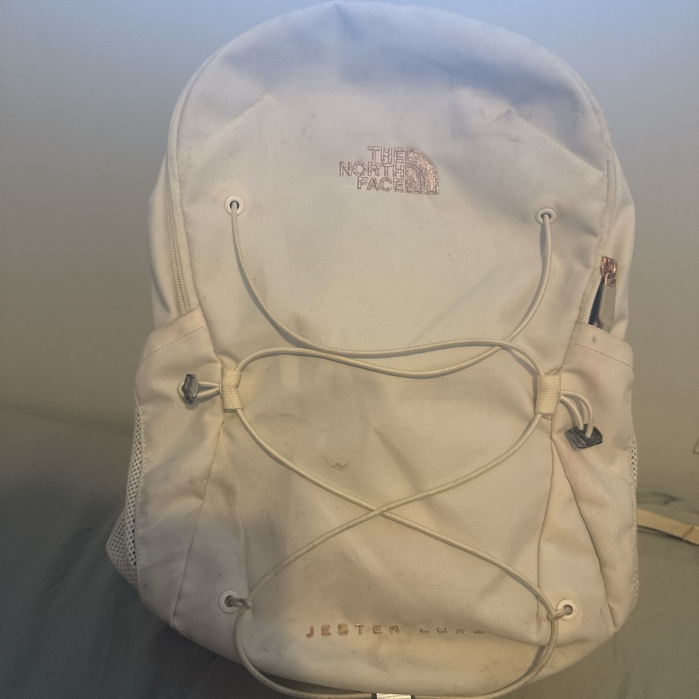 The North Face Cream Backpack with Bungee Cords